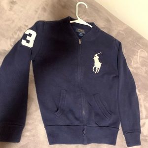 This is a Polo sweater size M (10-12)